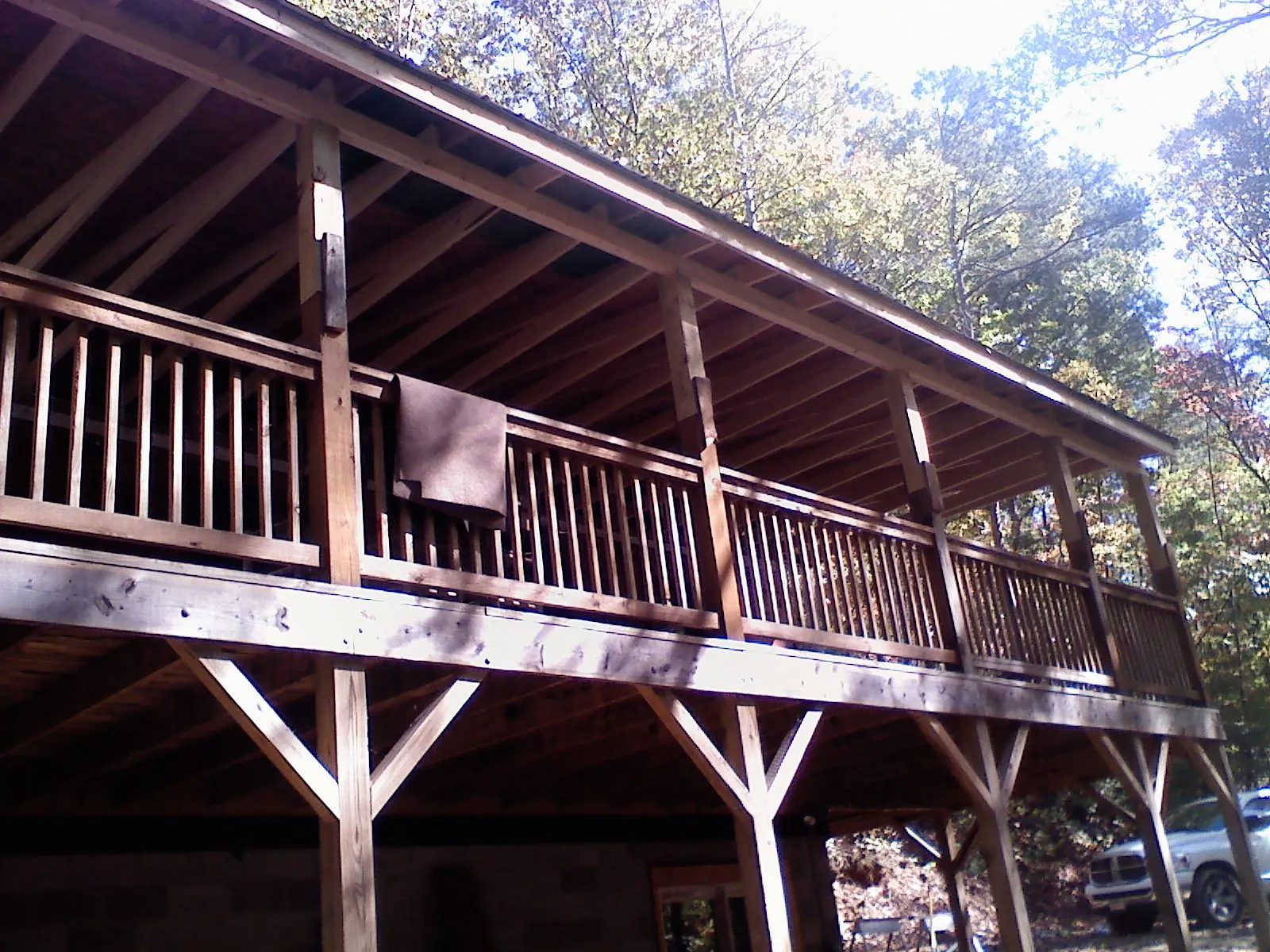 Timber framing under a new elevated porch and deck — Roof Leak Repair in Sour Lake by Roofing Brothers